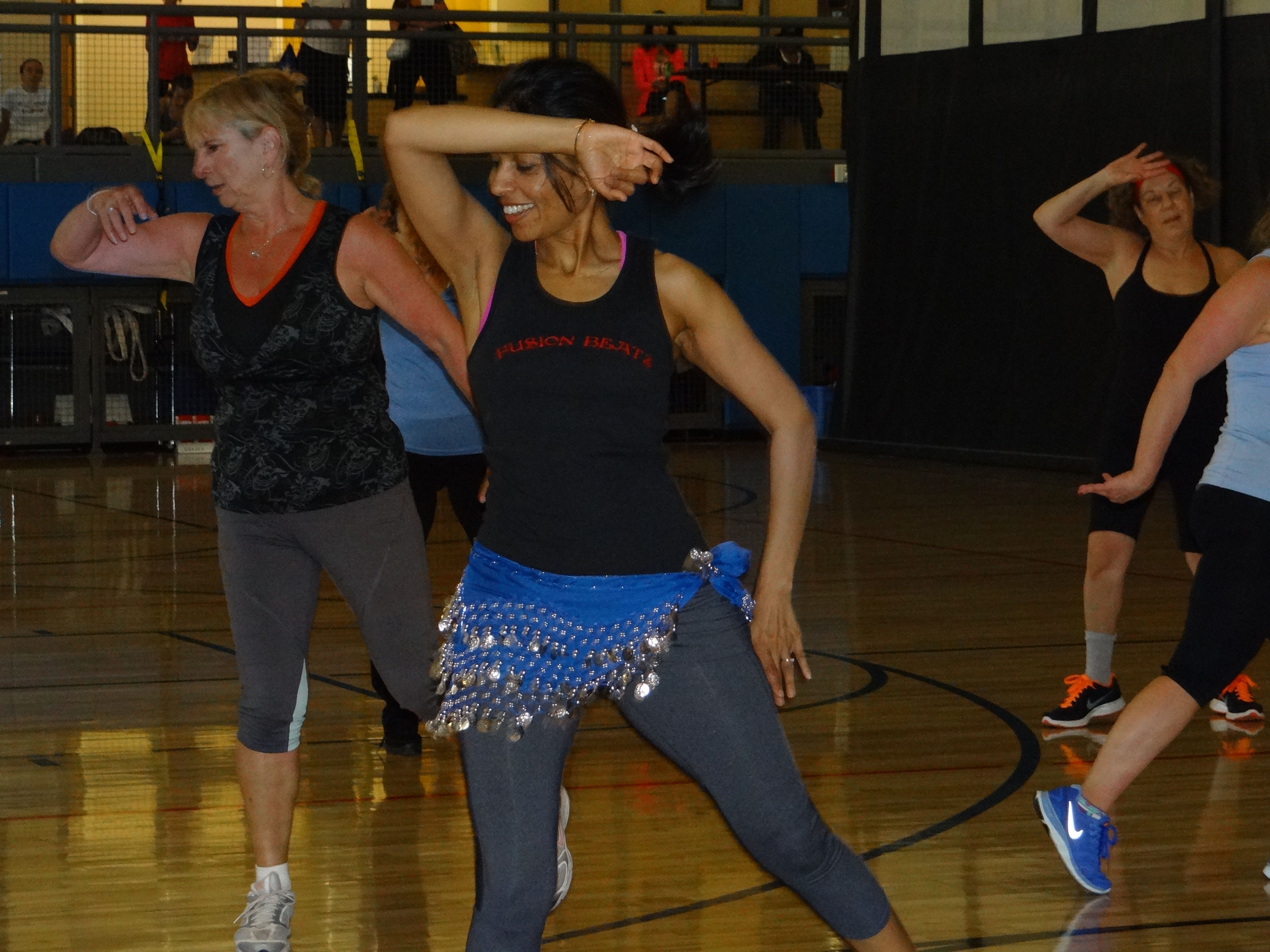 Instructor, Mitali teaching the bollyshake to folks attending the Fitness Fest conference